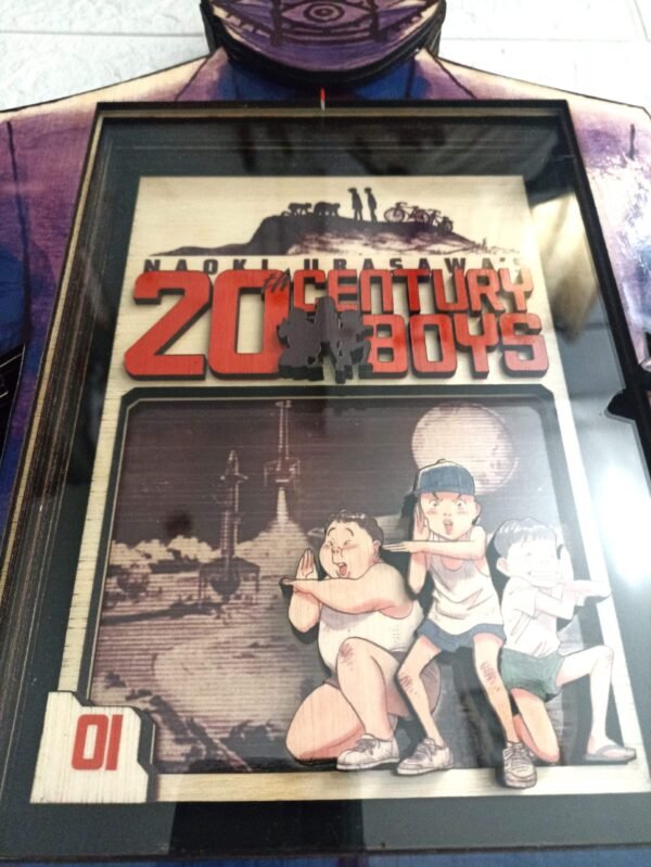 3D wooden shadowbox featuring the cover of the first volume of 20th Century Boys