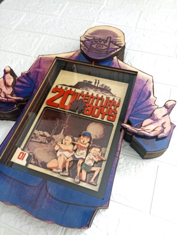 3D wooden shadowbox featuring the cover of the first volume of 20th Century Boys