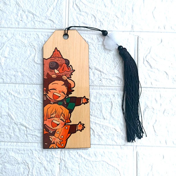 Handcrafted wooden bookmark featuring Kimetsu no Yaiba (Demon Slayer) design, made from 3mm plywood with vibrant sublimated colors, and customizable tassel.