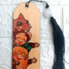 Handcrafted wooden bookmark featuring Kimetsu no Yaiba (Demon Slayer) design, made from 3mm plywood with vibrant sublimated colors, and customizable tassel.