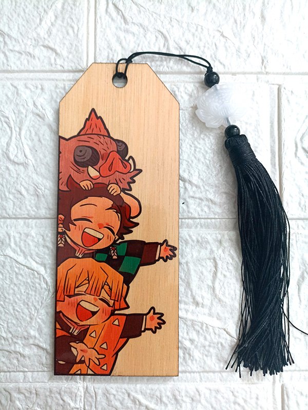 Handcrafted wooden bookmark featuring Kimetsu no Yaiba (Demon Slayer) design, made from 3mm plywood with vibrant sublimated colors, and customizable tassel.