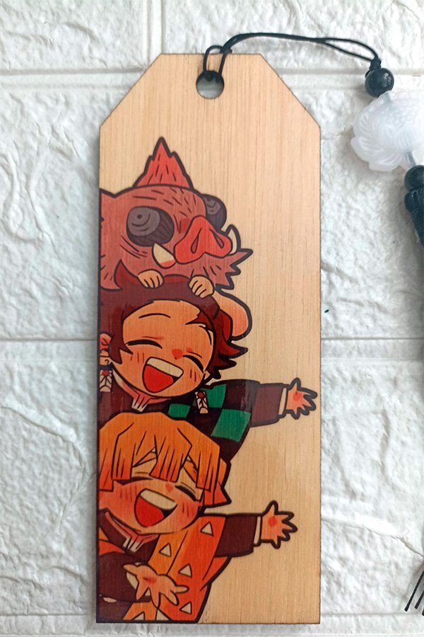 Handcrafted wooden bookmark featuring Kimetsu no Yaiba (Demon Slayer) design, made from 3mm plywood with vibrant sublimated colors, and customizable tassel.