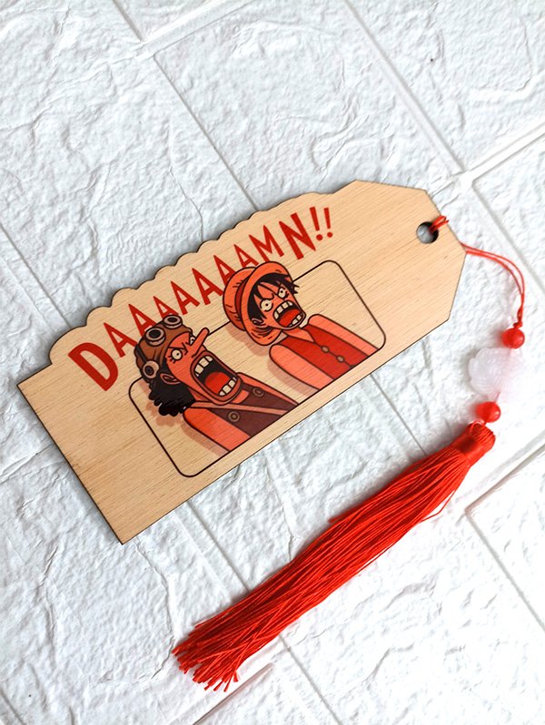 Handcrafted wooden bookmark featuring Luffy and Usopp from One Piece.