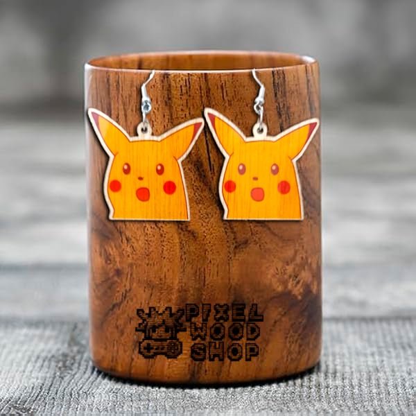 Handcrafted wooden earrings featuring the surprised Pikachu meme face