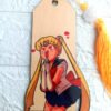 Handcrafted wooden bookmark featuring Sailor Moon design, made from 3mm plywood with vibrant sublimated colors, and customizable tassel.