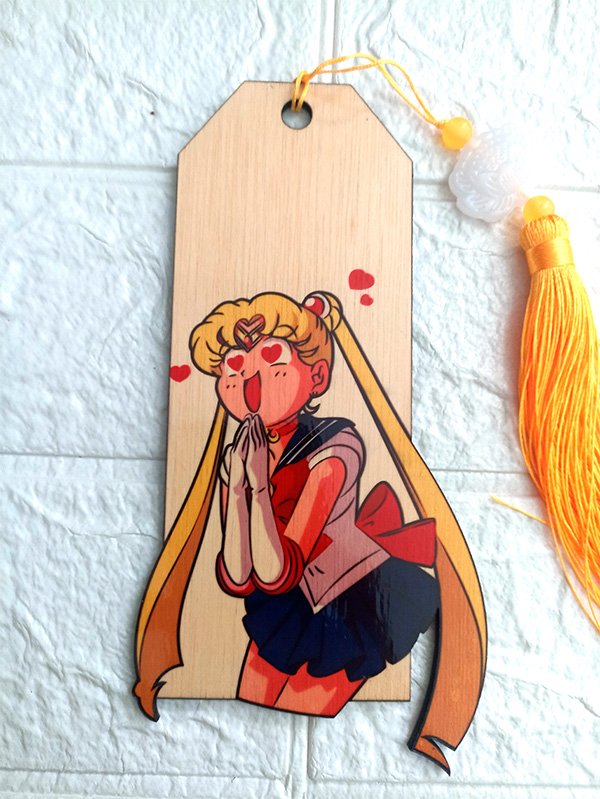 Handcrafted wooden bookmark featuring Sailor Moon design, made from 3mm plywood with vibrant sublimated colors, and customizable tassel.