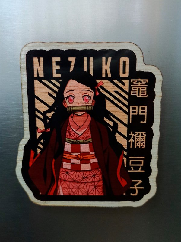 Handcrafted wooden magnet set featuring five distinct designs inspired by Demon Slayer. Each magnet is intricately detailed with vibrant colors, perfect for fans of the anime to display their love for the series