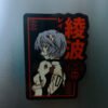 Handcrafted wooden magnet set featuring five unique designs inspired by Evangelion. Each magnet showcases detailed artwork and vibrant colors, perfect for adding a touch of anime style to any space. A must-have for fans of the iconic series.